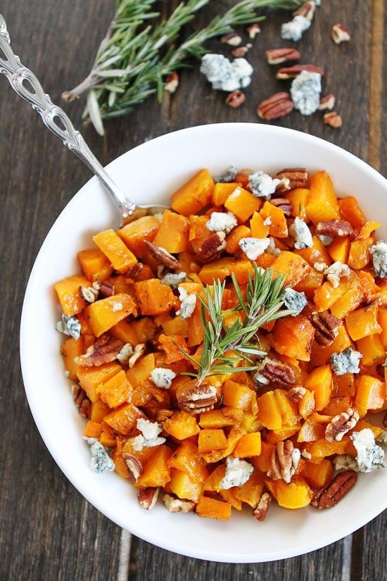 Roasted Butternut Squash with Balsamic, Blue Cheese, and Pecans Recipe on twopeasandtheirpod.com The perfect side dish for fall and all of your holiday meals! Roasted Butternut Squash with Balsamic, Blue Cheese, and Pecans Recipe