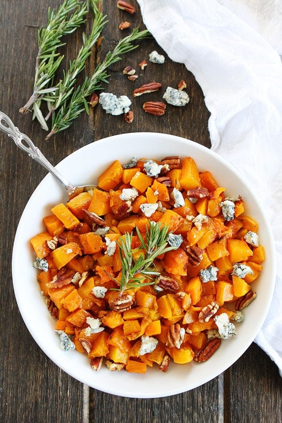 Roasted Butternut Squash with Balsamic, Blue Cheese, and Pecans Recipe on twopeasandtheirpod.com This easy side dish is perfect for Thanksgiving! Roasted Butternut Squash with Balsamic, Blue Cheese, and Pecans Recipe