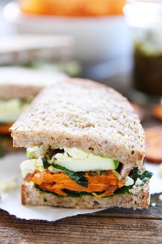 Roasted Sweet Potato Sandwich with Apples, Pesto, Kale, and Blue Cheese Recipe on twopeasandtheirpod.com This sandwich is full of flavor and perfect for fall! Sweet Potato, Apple, Kale, and Pesto Sandwich Recipe