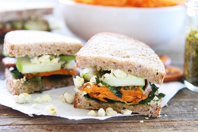 Roasted Sweet Potato Sandwich with Apples, Pesto, Kale, and Blue Cheese Recipe on twopeasandtheirpod.com This vegetarian sandwich is packed with flavor! It is great for lunch or dinner! Roasted Sweet Potato Sandwich with Apples, Pesto, Kale, and Blue Cheese Recipe