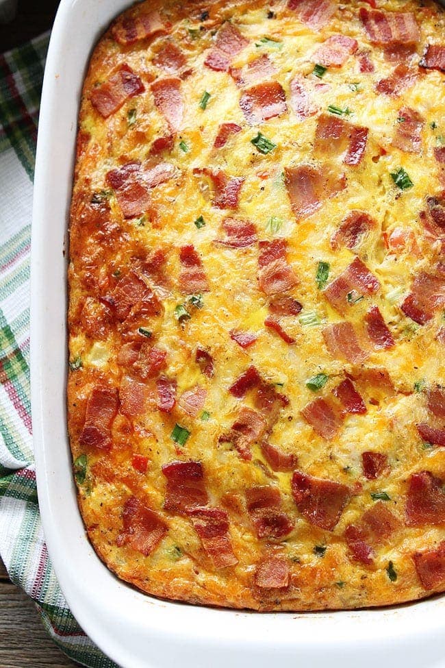 Bacon, Potato, and Egg Casserole Recipe on twopeasandtheirpod.com This easy breakfast casserole is packed with bacon, potatoes, and cheese! It is perfect for breakfast, brunch, or even dinner! Bacon, Potato, and Egg Casserole Recipe