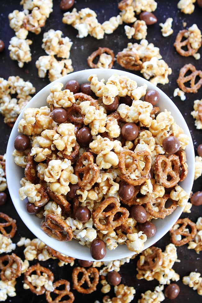 Peanut Butter Pretzel Popcorn Recipe on twopeasandtheirpod.com Love this sweet and salty popcorn! It's perfect for parties, movie night, game day, or every day snacking! Peanut Butter Pretzel Popcorn Recipe