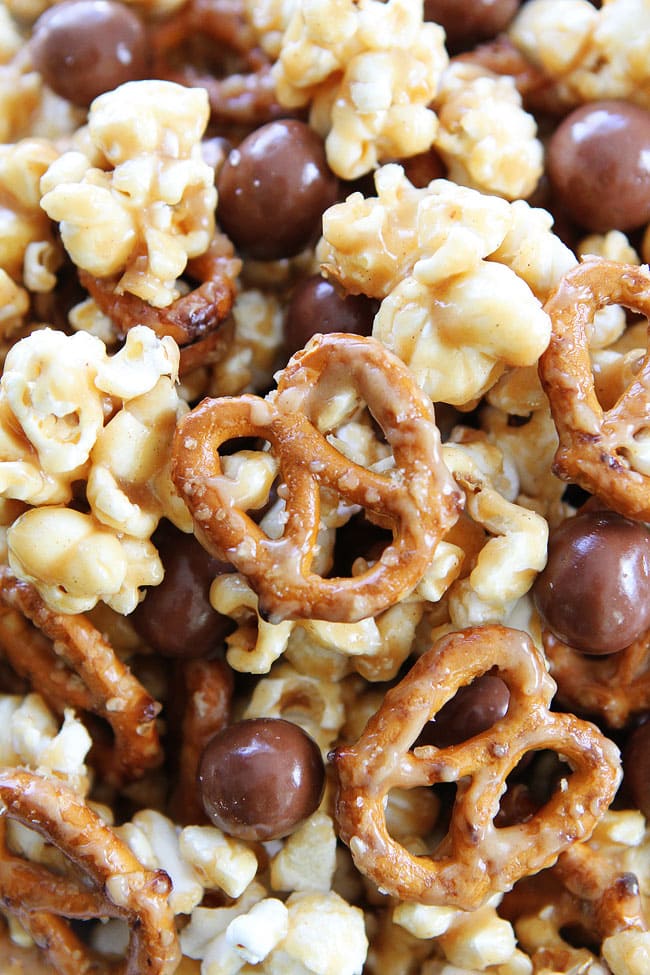 Peanut Butter Pretzel Popcorn Recipe on twopeasandtheirpod.com Love this sweet and salty popcorn! It's perfect for parties or every day snacking! Peanut Butter Pretzel Popcorn Recipe