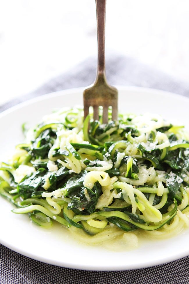 5-Ingredient Spinach Parmesan Zucchini Noodles Recipe on twopeasandtheirpod.com You only need 5 ingredients and 20 minutes to make this easy and healthy dish! Add it to your dinner menu now! Zucchini Spaghetti Noodles with Spinach and Parmesan