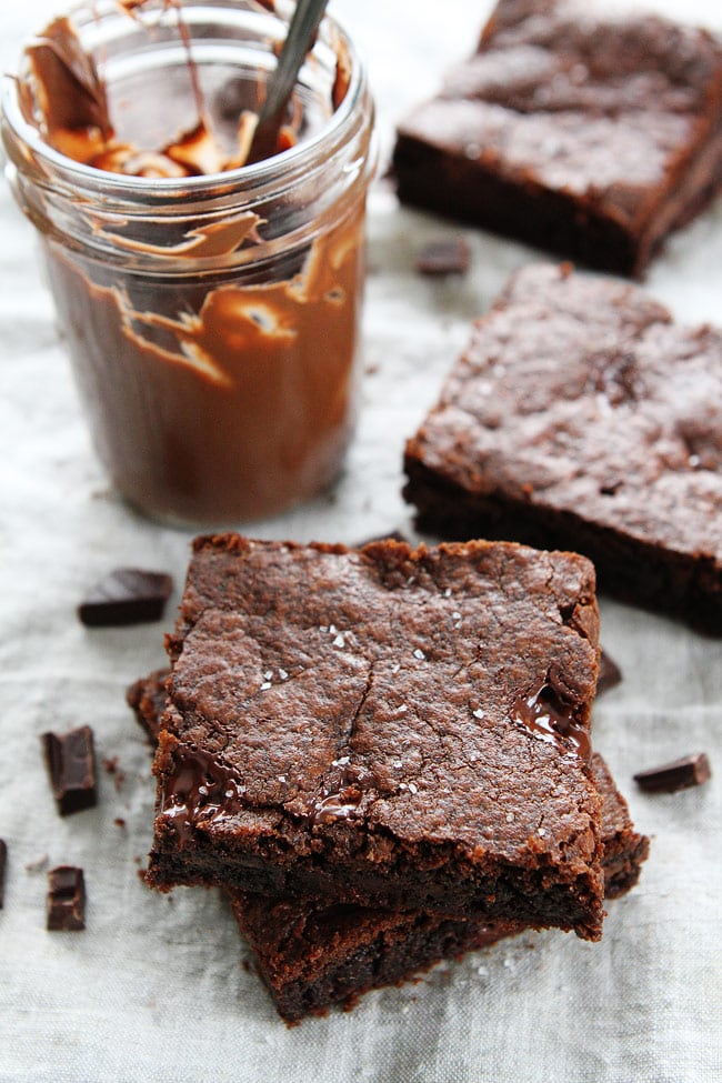 Chocolate Nutella Cookie Bars with Sea Salt Recipe on twopeasandtheirpod.com These rich and fudgy cookie bars are loaded with chocolate chunks, Nutella, and sprinkled with sea salt. I LOVE these cookie bars! Chocolate Nutella Cookie Bars with Sea Salt Recipe