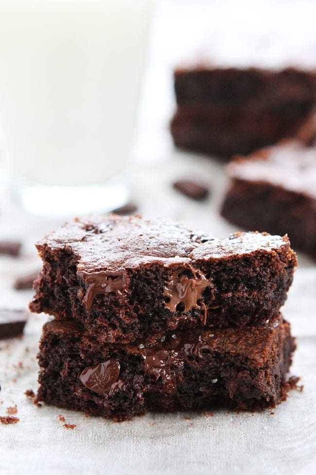 Chocolate Nutella Cookie Bars with Sea Salt Recipe on twopeasandtheirpod.com These rich and fudgy cookie bars are loaded with chocolate chunks and Nutella! They are TOO good! Chocolate Nutella Cookie Bars with Sea Salt Recipe