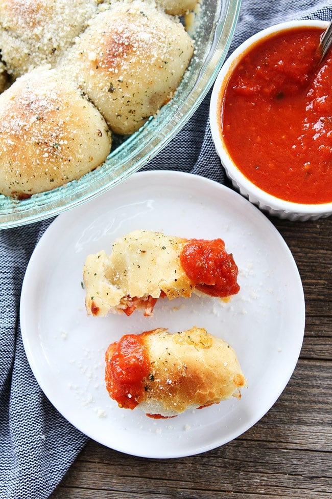 Pepperoni Pizza Rolls Recipe on twopeasandtheirpod.com These easy pizza rolls are great for game day, parties, or any day! pizza rolls with pepperoni and marinara