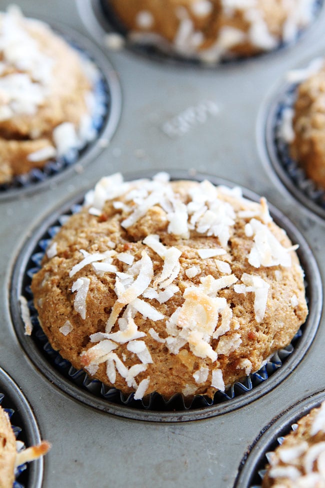Whole Wheat Banana Coconut Muffins Recipe on twopeasandtheirpod.com Use your brown bananas to make these easy and healthy muffins! Whole Wheat Banana Coconut Muffins Recipe