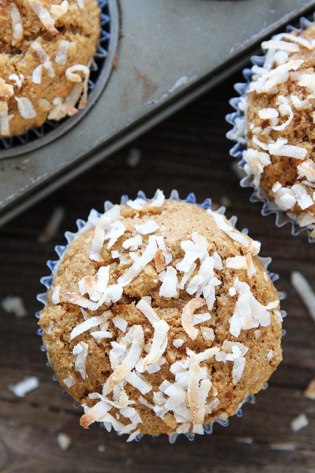 Whole Wheat Banana Coconut Muffins Recipe on twopeasandtheirpod.com These healthy vegan muffins are easy to make and so delicious! I keep some in the freezer at all times! Whole Wheat Banana Coconut Muffins Recipe