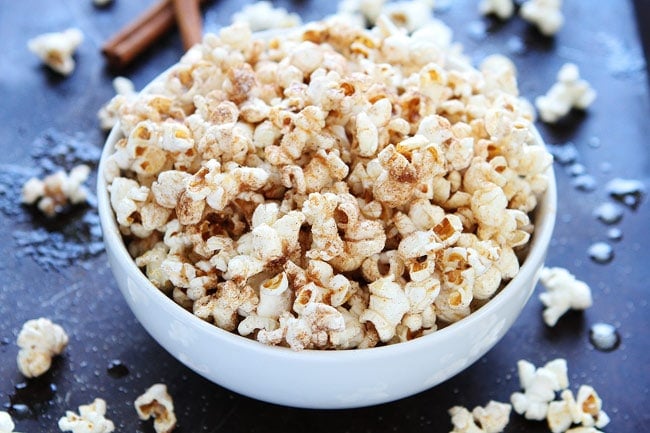 Brown Butter Cinnamon Sugar Popcorn Recipe on twopeasandtheirpod.com This simple and sweet popcorn is super easy to make and SO good! You have to try it! Brown Butter Cinnamon Sugar Popcorn Recipe