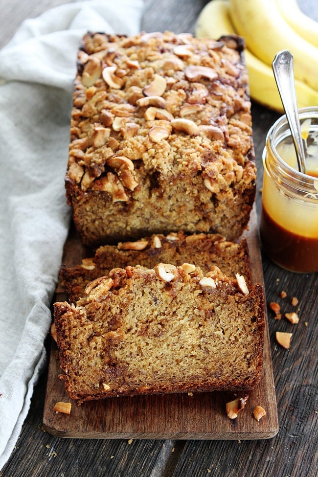 Salted Caramel Cashew Banana Bread Recipe on twopeasandtheirpod.com Banana bread with a salted caramel swirl and cashew streusel topping! The sweet and salty combo is amazing! Salted Caramel Cashew Banana Bread Recipe