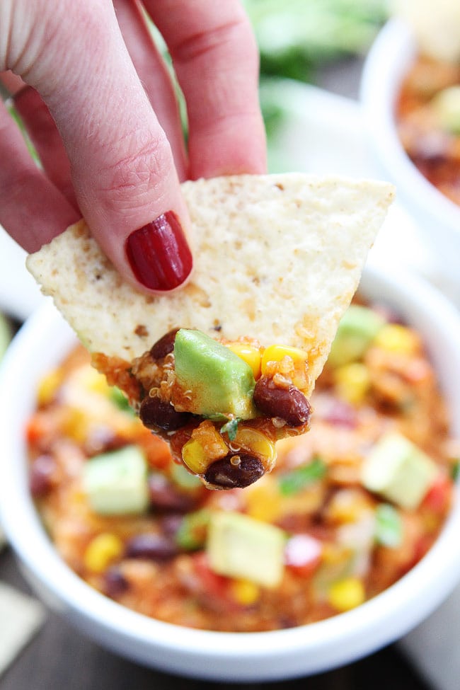 Slow Cooker Enchilada Quinoa Recipe on twopeasandtheirpod.com Our favorite crockpot meal! It is SO good and so easy to make! Slow Cooker Enchilada Quinoa Recipe