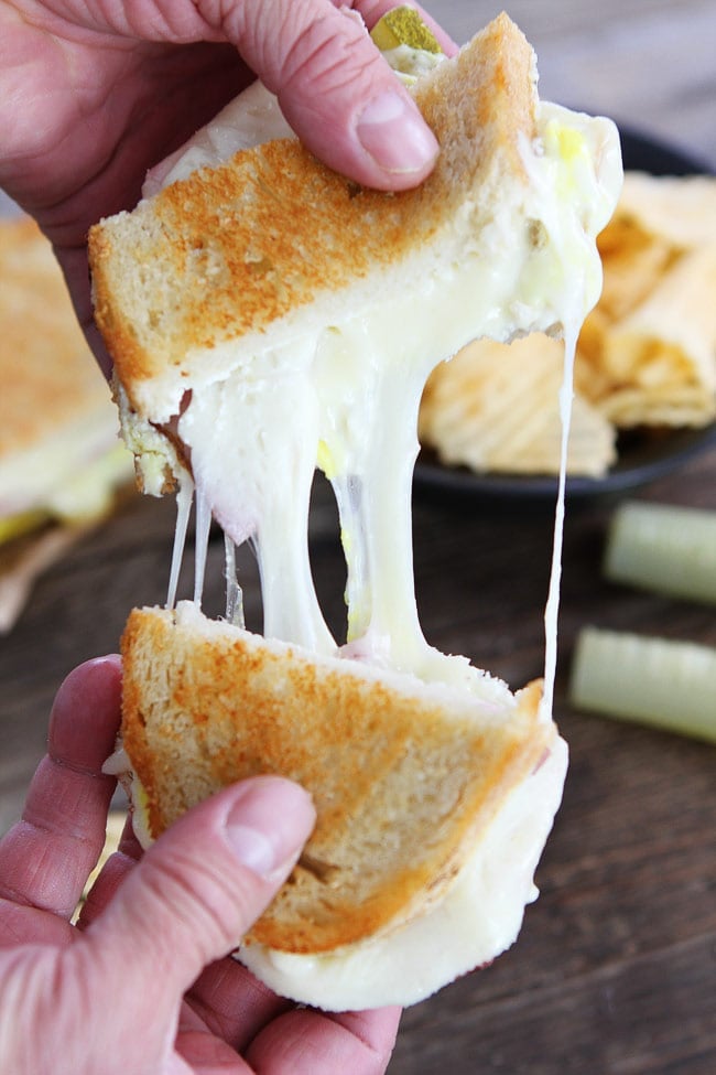 Dill Pickle Wrap Grilled Cheese Recipe on twopeasandtheirpod.com This grilled cheese is inspired by everyone's favorite dill pickle wraps. It is an amazing grilled cheese! Dill Pickle Wrap Grilled Cheese Sandwich