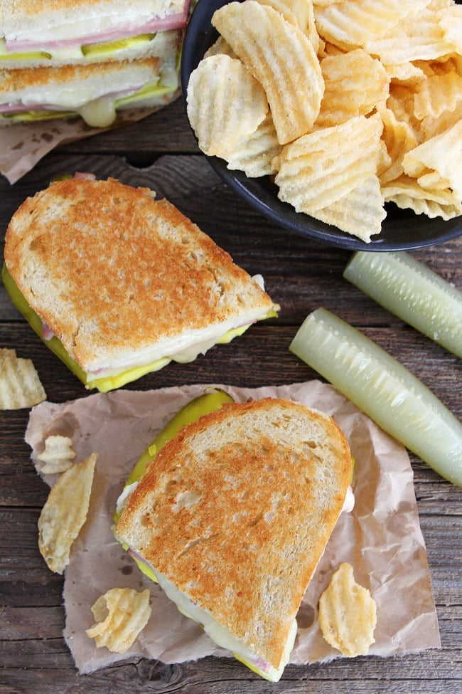 Dill Pickle Wrap Grilled Cheese Recipe on twopeasandtheirpod.com You have to try this grilled cheese sandwich! The flavor combo is incredible! Dill Pickle Wrap Grilled Cheese Recipe