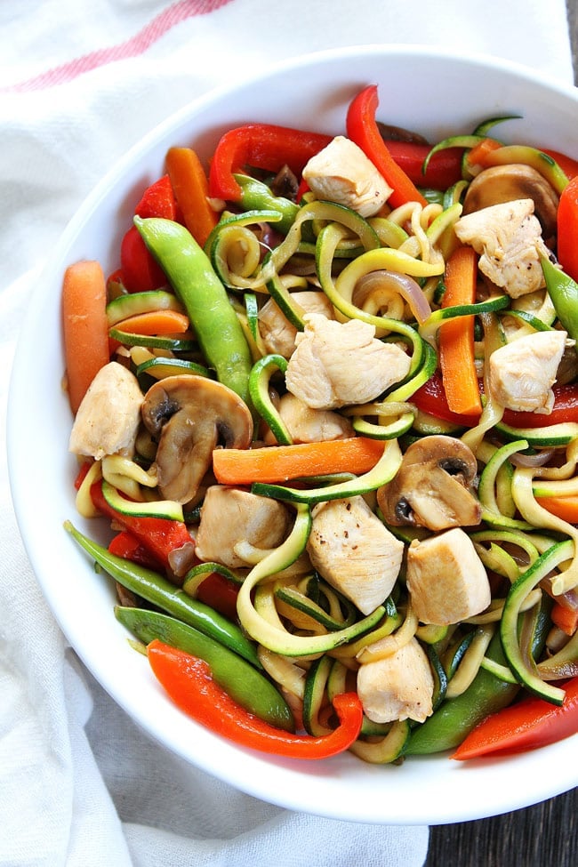 Easy Chicken Zucchini Noodle Stir Fry Recipe on twopeasandtheirpod.com You can have this healthy stir fry on your dinner table in 30 minutes! Easy Chicken Zucchini Noodle Stir Fry Recipe