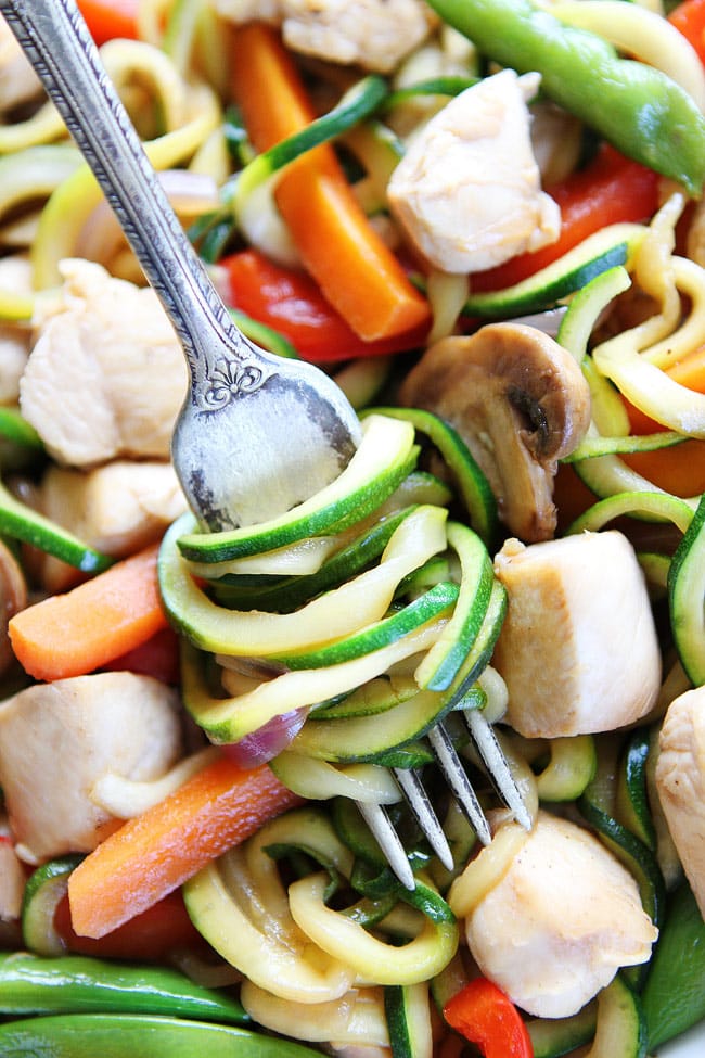 Easy Chicken Zucchini Noodle Stir Fry Recipe on twopeasandtheirpod.com The entire family will love this healthy and delicious stir fry! And it only takes 30 minutes to make! Easy Chicken Zucchini Noodle Stir Fry Recipe