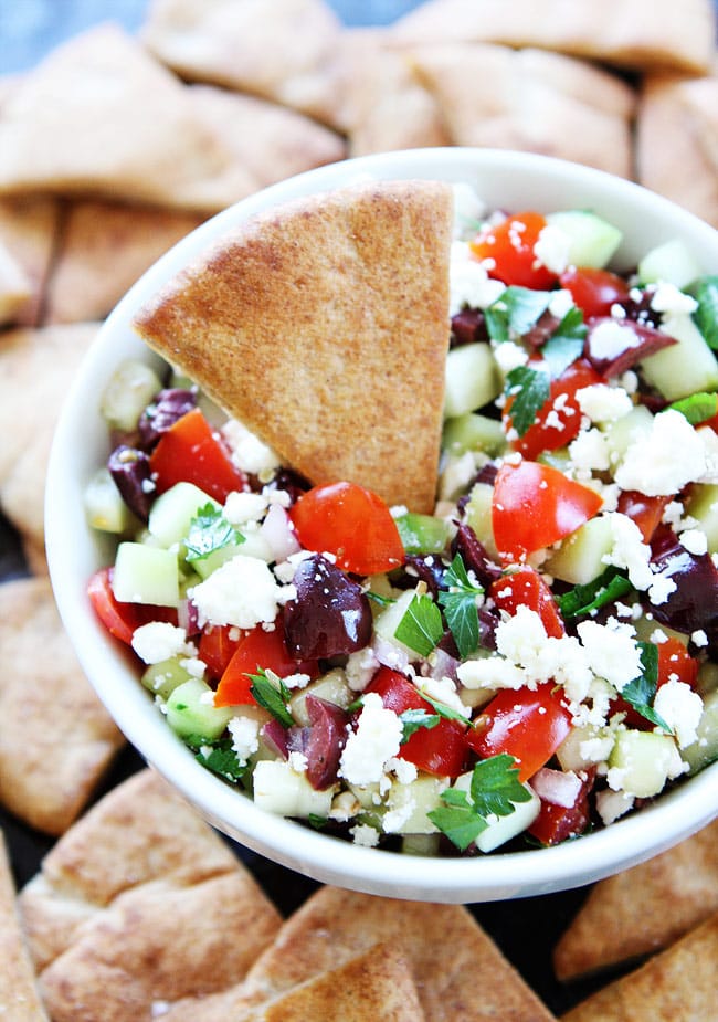 Greek Salsa Recipe on twopeasandtheirpod.com This simple and fresh Greek salsa is great with pita chips or served with chicken or fish! Greek Salsa Recipe