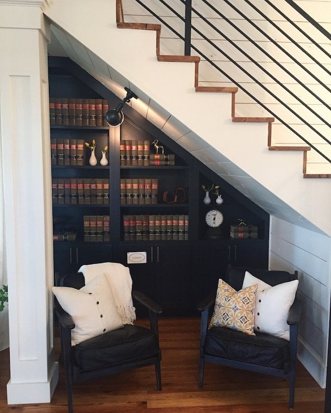 Fixer Upper's Magnolia House! Get a full tour on twopeasandtheirpod.com I love this reading nook under the stairs! Fixer Upper's Magnolia House
