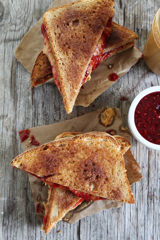 Cinnamon Sugar Toast PB&J Recipe on twopeasandtheirpod.com Two classics come together to create the BEST peanut butter jelly and sandwich! Kids and adults will love this easy sandwich! Cinnamon Sugar Toast PB&J Recipe