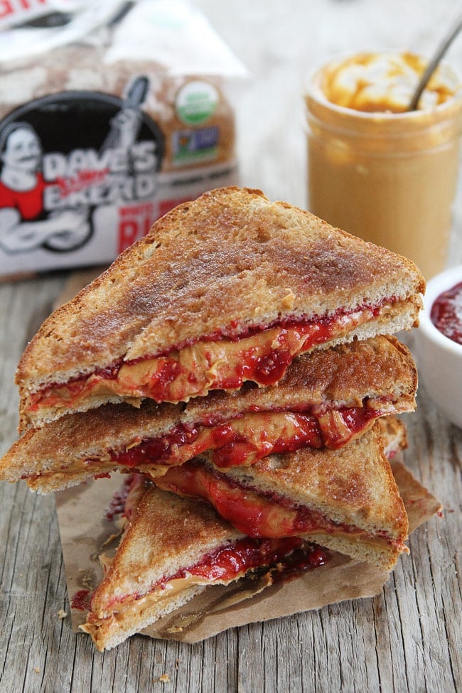 Cinnamon Sugar Toast PB&J Recipe on twopeasandtheirpod.com Two classics come together to create the BEST PB&J sandwich! It is great for breakfast, lunch, dinner, or dessert! Cinnamon Sugar Toast Peanut Butter and Jelly Sandwich Recipe