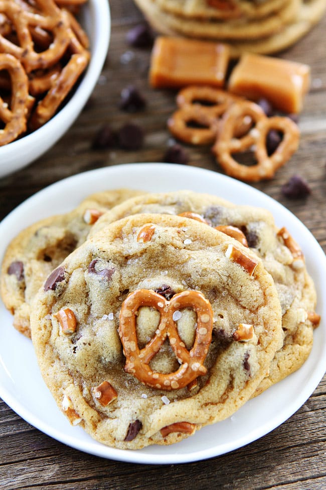 Salted Caramel Pretzel Chocolate Chip Cookie Recipe on twopeasandtheirpod.com Chocolate chip cookies with salted caramel, pretzels, and sea salt! These cookies are amazing! Salted Caramel Pretzel Chocolate Chip Cookie Recipe