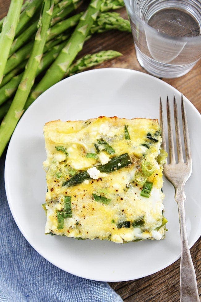 Spring Vegetable Egg Casserole Recipe on twopeasandtheirpod.com This easy egg casserole is the perfect breakfast for spring! It feeds a crowd or can be reheated. Spring Vegetable Egg Casserole Recipe