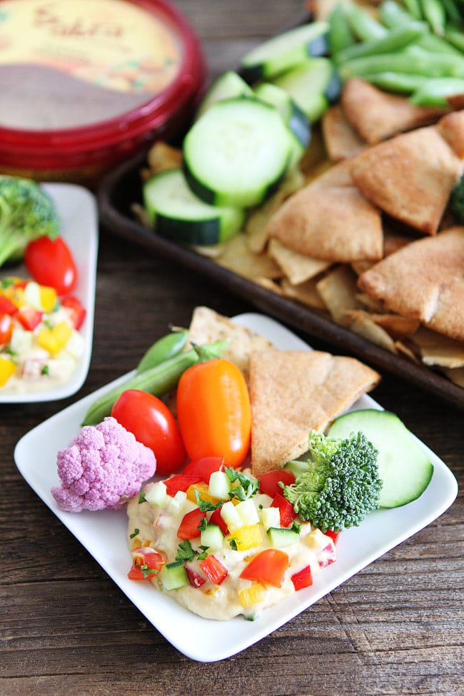 Veggie Hummus Recipe on twopeasandtheirpod.com This simple and healthy hummus is great for parties or everyday snacking! Everyone loves it! Veggie Hummus Recipe