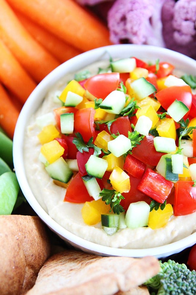 Veggie Hummus Recipe on twopeasandtheirpod.com Looking for an easy appetizer or snack? Make this colorful veggie hummus! It is so good! Veggie Hummus Recipe