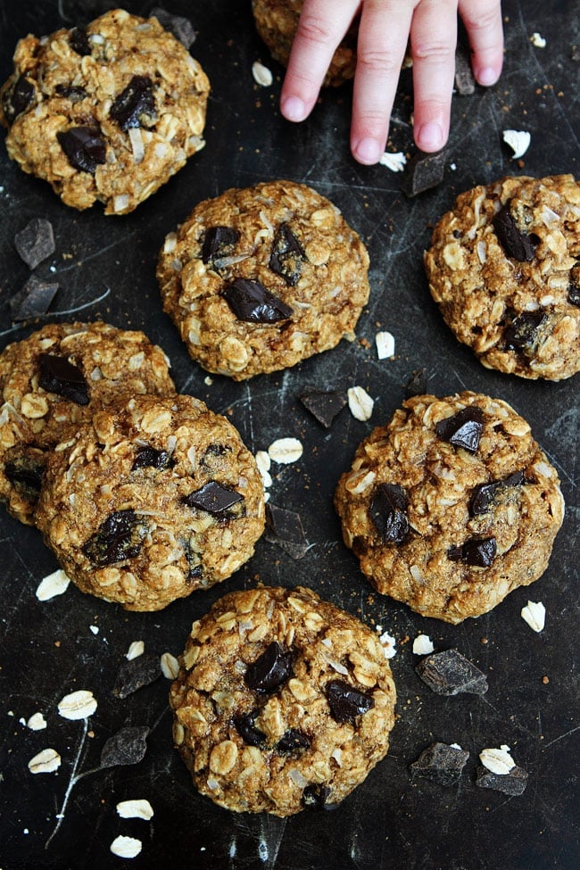 Whole Wheat Banana Coconut Oatmeal Chocolate Chunk Cookies Recipe on twopeasandtheirpod.com Use your brown bananas to make these healthy cookies. They are SO good! Whole Wheat Banana Coconut Oatmeal Chocolate Chunk Cookies Recipe