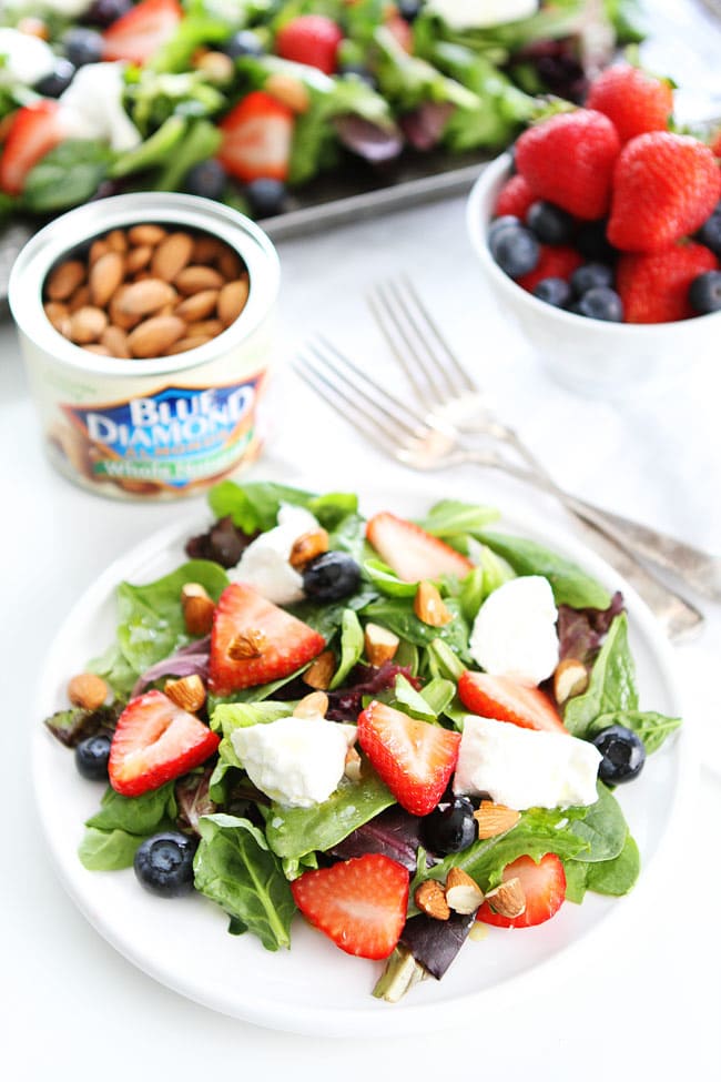 Berry, Burrata, and Almond Salad Recipe on twopeasandtheirpod.com Mixed greens topped with blueberries, strawberries, burrata cheese, almonds, and a simple honey lemon dressing! This simple and beautiful salad is perfect for summertime! Berry, Burrata, and Almond Salad Recipe