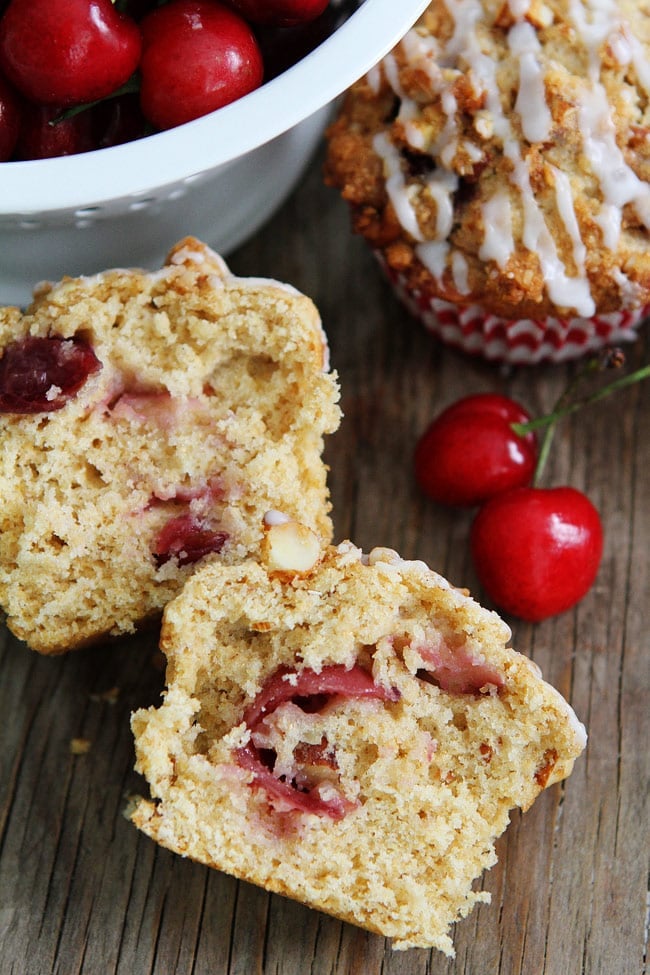 Cherry Almond Streusel Muffins Recipe on twopeasandtheirpod.com Cherry muffins with an almond streusel topping and sweet almond glaze! These muffins make a great summer breakfast treat! Cherry Almond Streusel Muffins Recipe