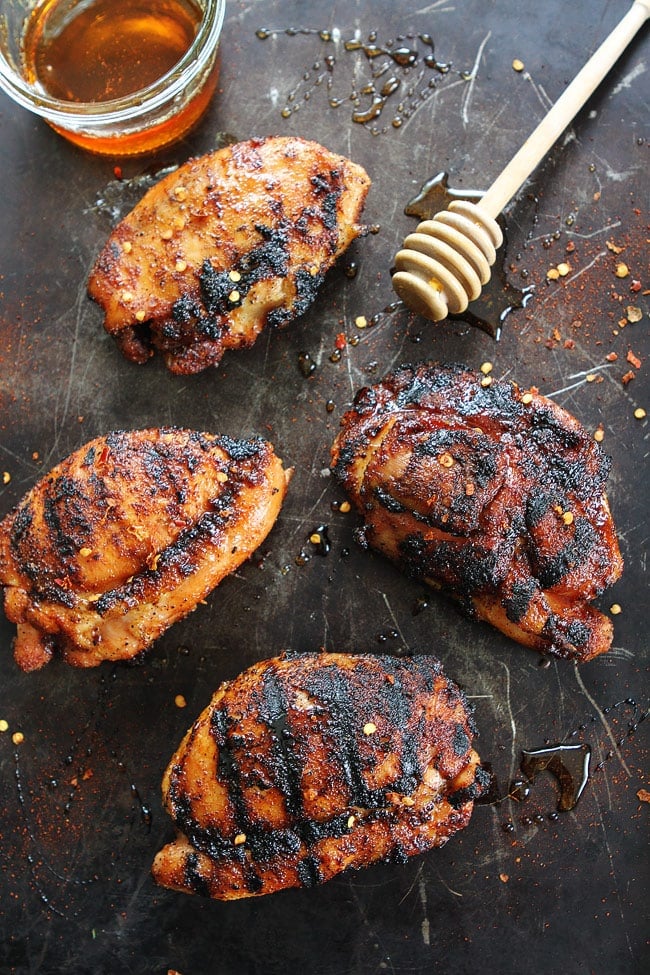 Sweet and Spicy Grilled Chicken Recipe on twopeasandtheirpod.com Get out your grill and make this easy grilled chicken for dinner! Sweet and Spicy Grilled Chicken Recipe
