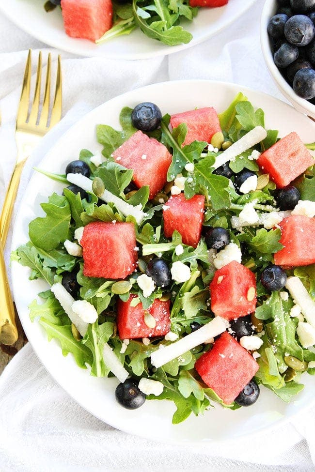 Watermelon, Blueberry, and Jicama Arugula Salad Recipe on twopeasandtheirpod.com Arugula salad with watermelon, blueberries, jicama, pepitas, and a simple honey lime dressing. This salad goes great with any summer meal! Watermelon, Blueberry, and Jicama Arugula Salad Recipe
