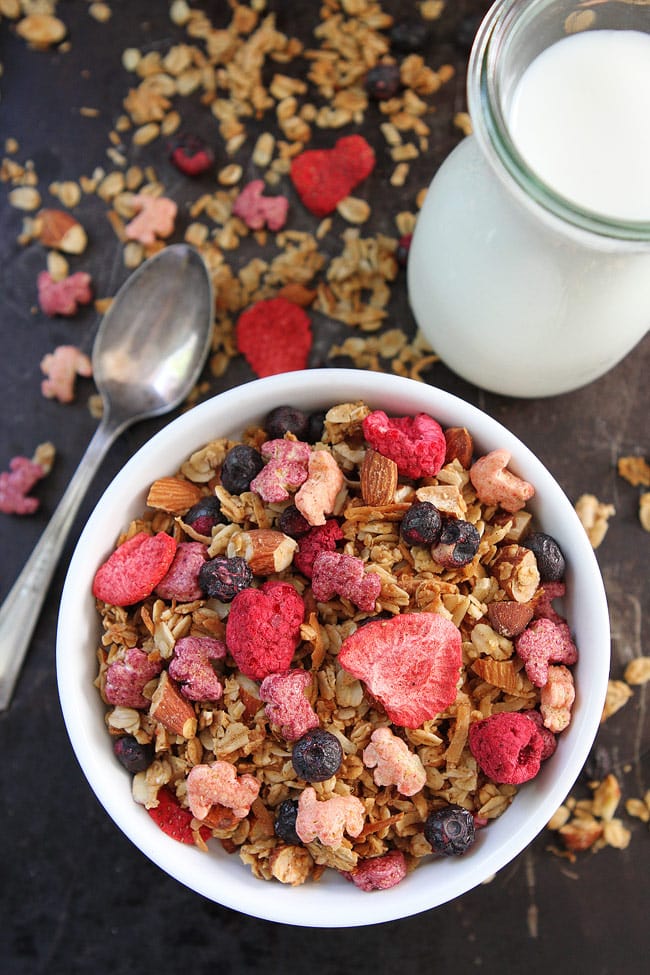 Berry Granola Recipe on twopeasandtheirpod.com This easy homemade granola is bursting with berries. It is the BEST granola recipe. Berry Granola Recipe