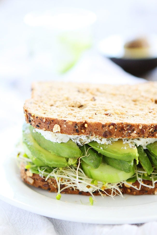 Cucumber and Avocado Sandwich Recipe on twopeasandtheirpod.com This fresh and simple sandwich is easy to make and great for lunch or dinner! Cucumber and Avocado Sandwich Recipe