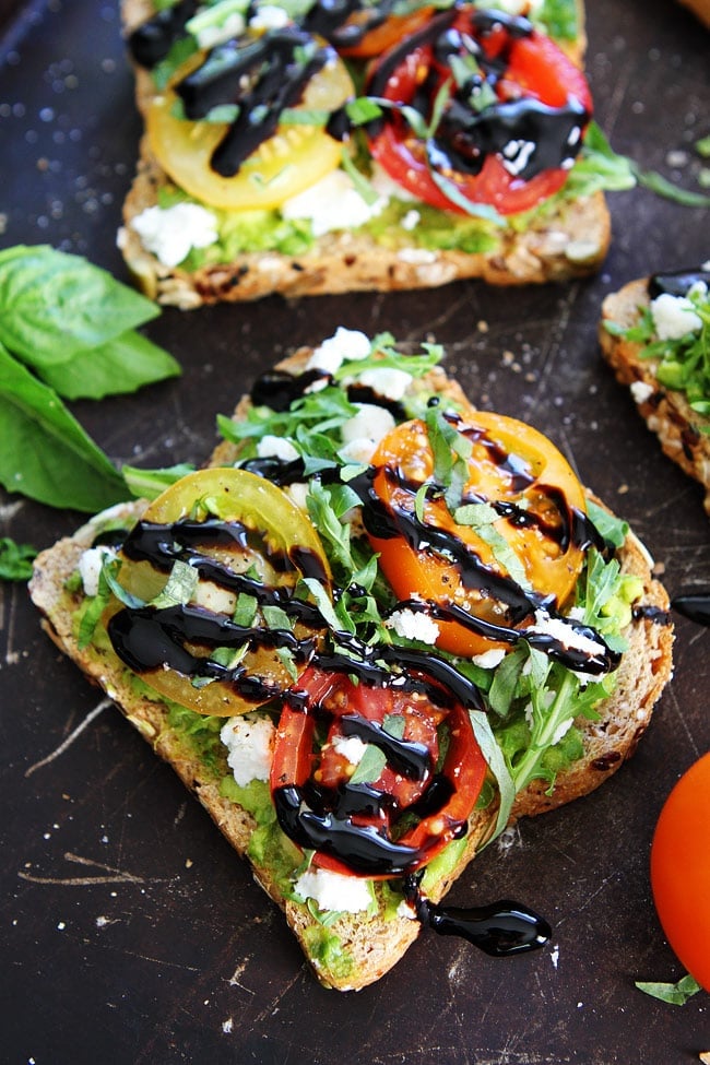 Avocado, Tomato, and Goat Cheese Toast Recipe on twopeasandtheirpod.com Avocado toast with tomatoes, goat cheese, arugula, basil, and a drizzle of balsamic glaze. This is the BEST avocado toast and it's easy to make too! Avocado, Tomato, and Goat Cheese Toast Recipe