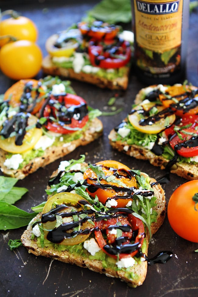 Avocado, Tomato, and Goat Cheese Toast Recipe on twopeasandtheirpod.com This simple and delicious avocado toast is great for breakfast, lunch, dinner or snack time! Avocado, Tomato, and Goat Cheese Toast Recipe