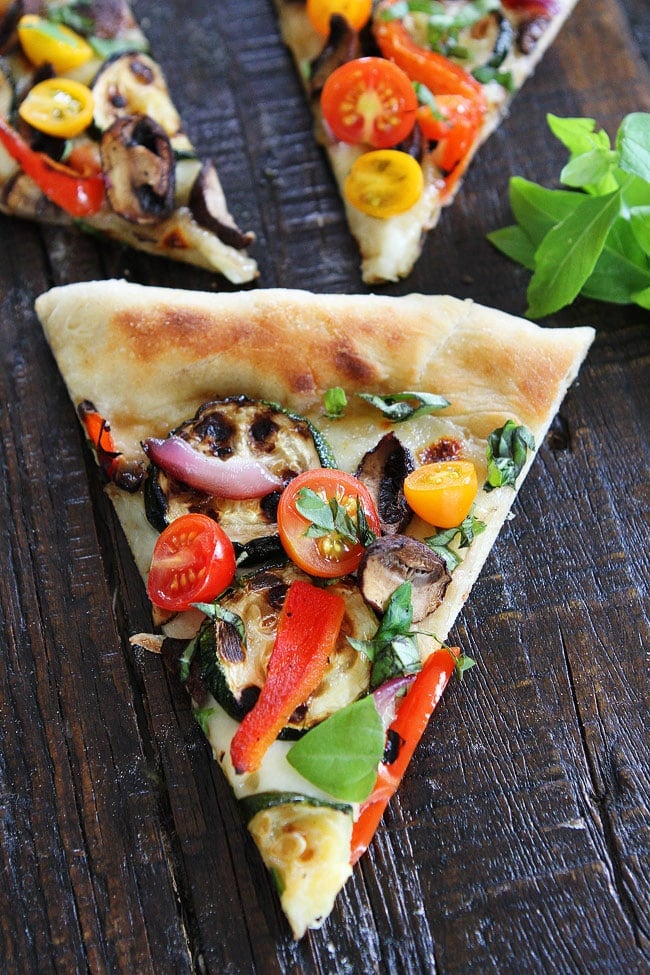 Garlic Butter Grilled Vegetable Pizza Recipe on twopeasandtheirpod.com This loaded veggie pizza is SO good! Garlic Butter Grilled Vegetable Pizza Recipe