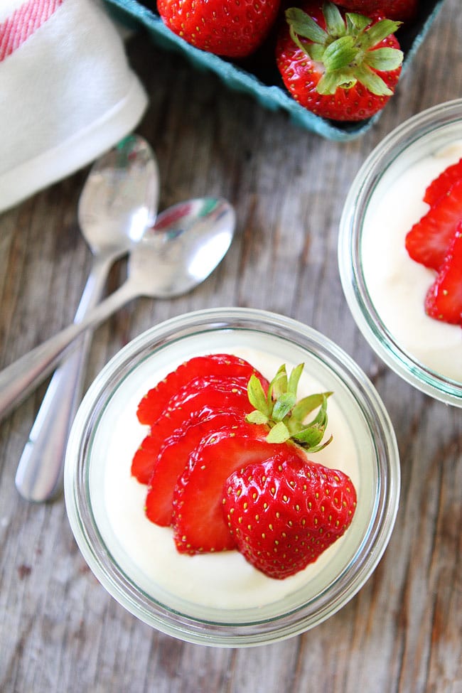 Mini No-Bake Cheesecakes Recipe on twopeasandtheirpod.com These adorable individually portioned desserts only take 30 minutes to make. I love the graham cracker crust and creamy cheesecake filling! Mini No-Bake Cheesecakes Recipe