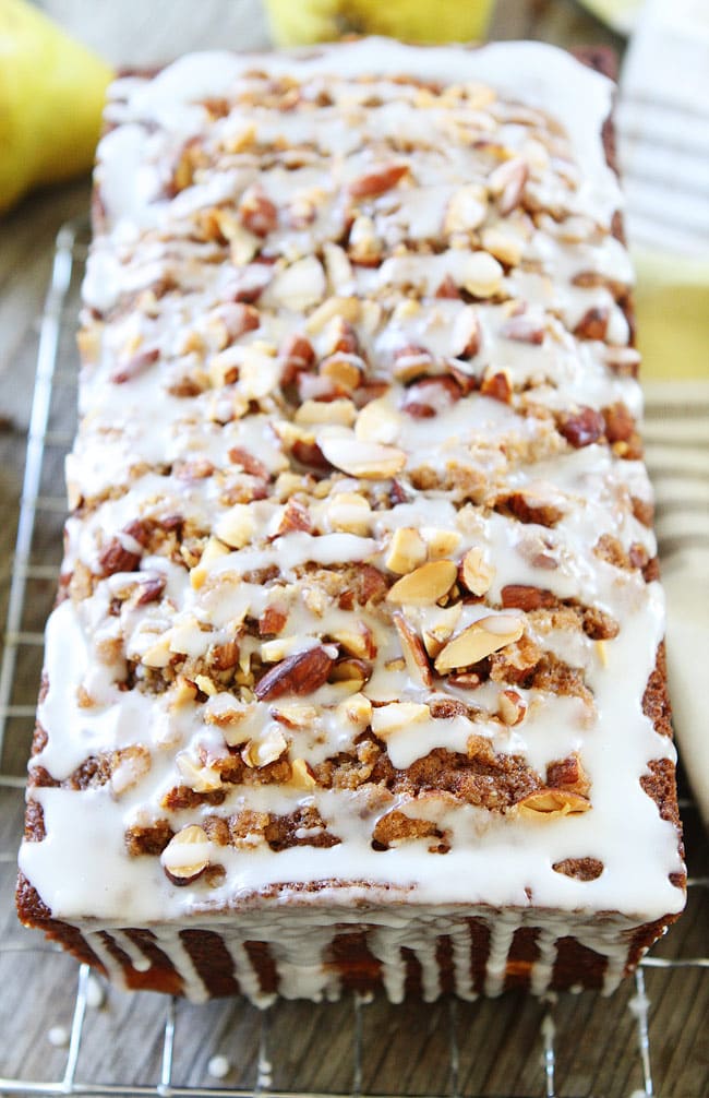 Pear Almond Streusel Bread Recipe on twopeasandtheirpod.com This easy pear quick bread has a sweet almond streusel topping and glaze. It is a fall favorite! Easy Pear Bread recipe with almond streusel topping