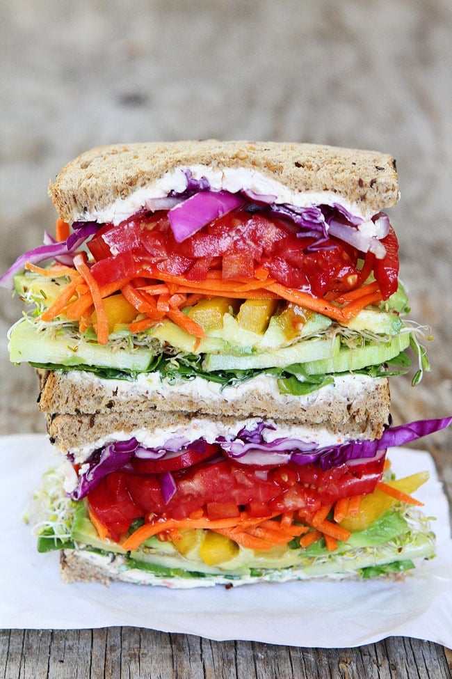 Rainbow Vegetable Sandwich Recipe on twopeasandtheirpod.com This colorful veggie sandwich is easy to make and fun to eat! It is the ultimate veggie sandwich! Rainbow Veggie Sandwich Recipe