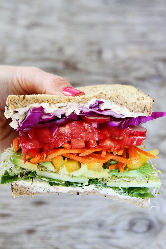 Rainbow Vegetable Sandwich Recipe on twopeasandtheirpod.com This healthy and delicious sandwich is layered with colorful veggies. It is my favorite sandwich! Rainbow Vegetable Sandwich Recipe