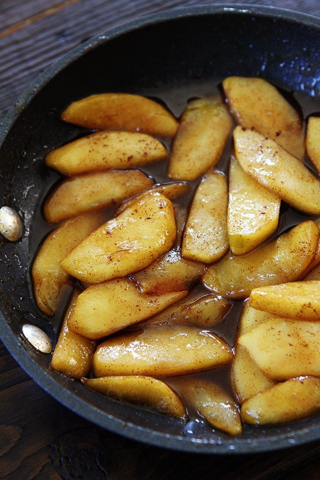 Peanut Butter Toast with Skillet Cinnamon Apples Recipe on twopeasandtheirpod.com This simple fall toast is great for breakfast, snack time, or even dessert. Peanut Butter Toast with Skillet Cinnamon Apples Recipe