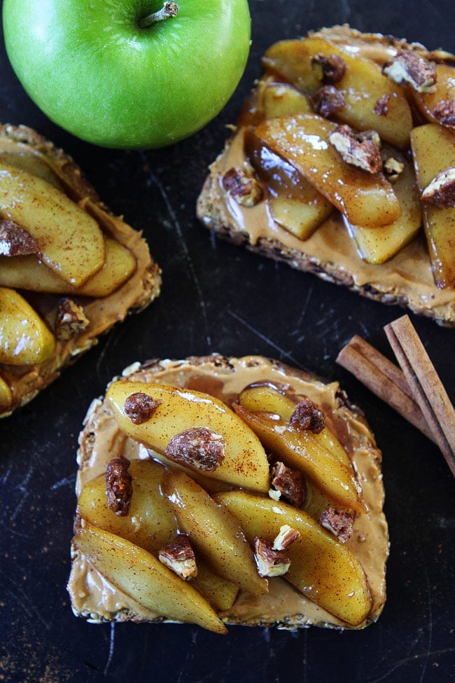 Peanut Butter Toast with Skillet Cinnamon Apples Recipe on twopeasandtheirpod.com This is the perfect toast for fall! It is easy to make and SO good! Peanut Butter Toast with Skillet Cinnamon Apples Recipe