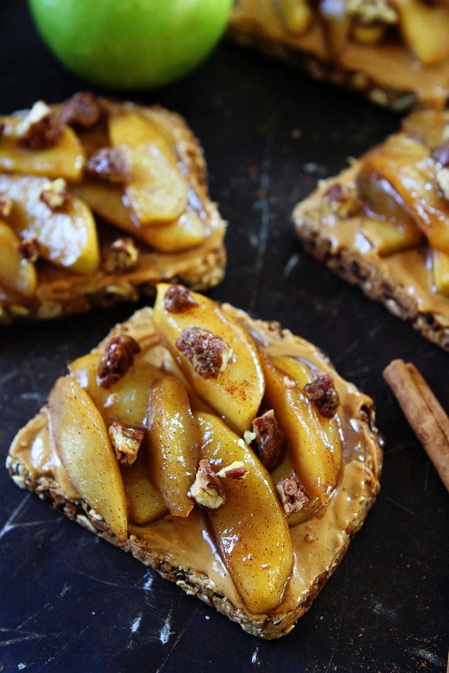 Peanut Butter Toast with Skillet Cinnamon Apples Recipe on twopeasandtheirpod.com Peanut butter toast topped with warm skillet cinnamon apples! This is the perfect toast for fall! Peanut Butter Toast with Skillet Cinnamon Apples Recipe
