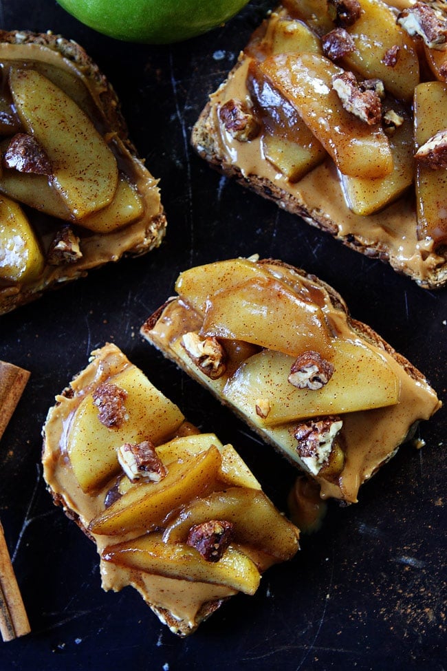 Peanut Butter Toast with Skillet Cinnamon Apples Recipe on twopeasandtheirpod.com This simple fall toast is great for breakfast, snack time, or even dessert. It is sure to become a fall favorite! Peanut Butter Toast with Skillet Cinnamon Apples Recipe