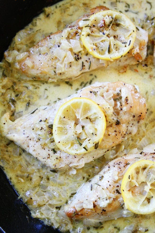 Skillet Creamy Lemon Rosemary Chicken Recipe on twopeasandtheirpod.com This quick and easy one-skillet chicken dish is great for busy weeknights or easy entertaining. Skillet Creamy Lemon Rosemary Chicken Recipe