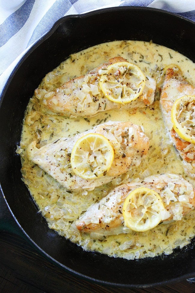 Skillet Creamy Lemon Rosemary Chicken Recipe on twopeasandtheirpod.com This quick and easy one-skillet chicken dish is a family favorite! We make it for dinner all of the time and everyone loves it! Skillet Creamy Lemon Rosemary Chicken Recipe