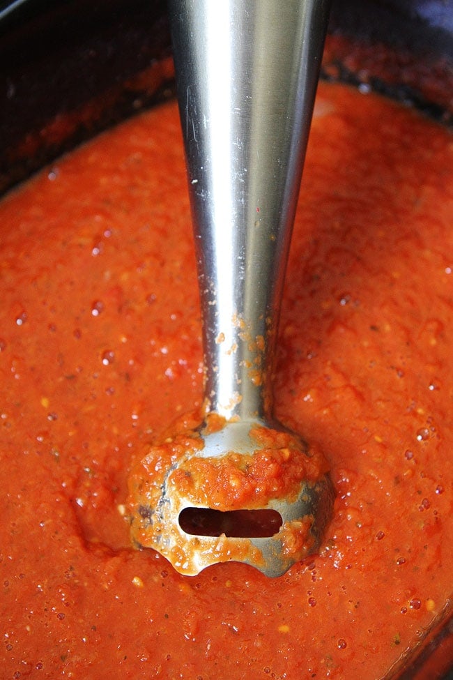 Slow Cooker Marinara Sauce Recipe on twopeasandtheirpod.com This easy marinara sauce is made in the crockpot and freezes beautifully.