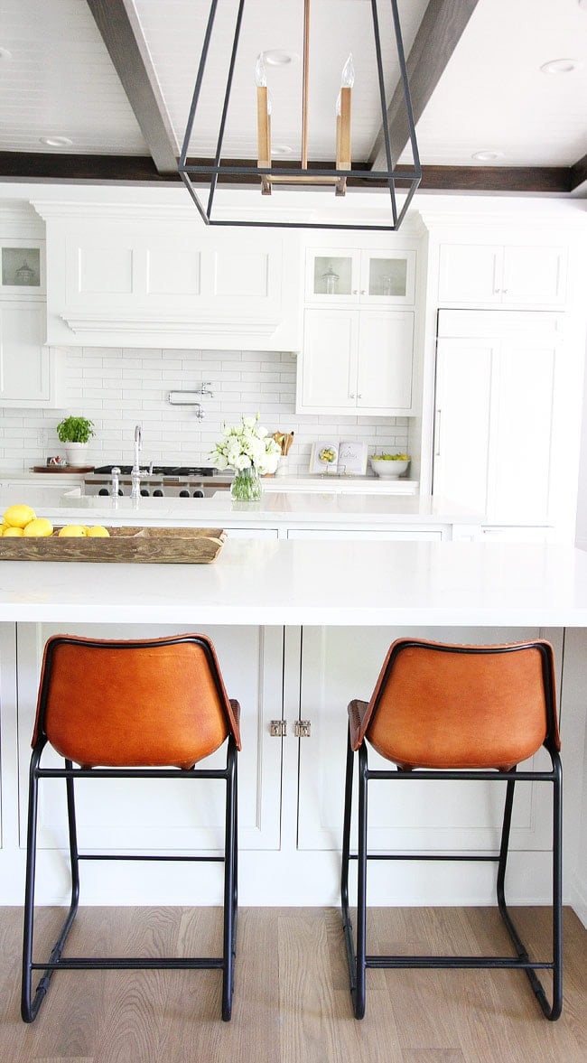 White Kitchen with an Open Concept on twopeasandtheirpod.com You will love this beautiful white kitchen. It is perfect in every way! White Kitchen with Open Concept